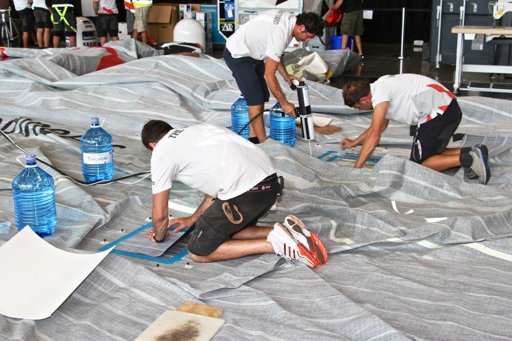 Sail repair - Volvo Ocean Race Support Teams - March 3, 2015 © Richard Gladwell www.photosport.co.nz